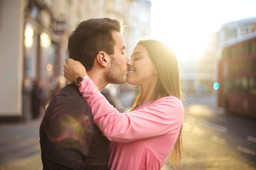 Lovely couple kissing in the street