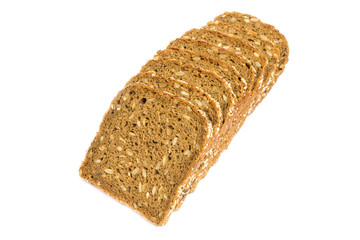 Loaf of fresh sliced multigrain gluten free bread with sesame, flax seeds, isolated on white.
