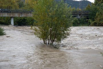 Flood of a river, water power