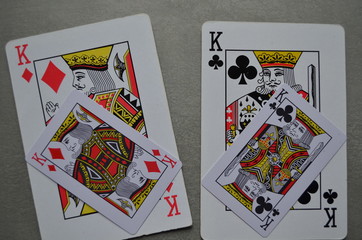 Casino. Poker. Playing cards. The opposition of large and small