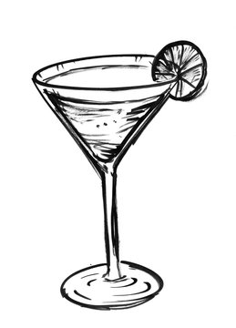 Black brush and ink artistic rough hand drawing of glass with cocktail drink and lime or lemon slice.