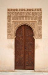 Detailed closeup view of decorated doors frame, Alhambra, Andalusia, Spain