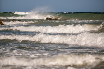 waves breaking on the beach