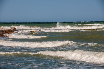 waves crashing on rocks
