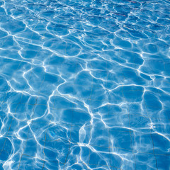 Surface of swimming pool water background