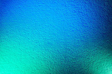 Fototapeta na wymiar Light blue background with light green spots