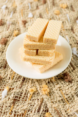 Wafer biscuits on white dish