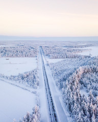 A wintry road in finnish winter wonderland