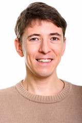 Fototapeta premium Studio shot of face of happy man smiling