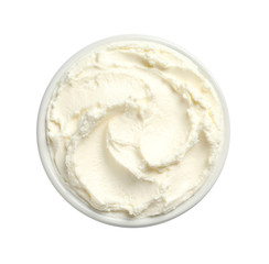 Bowl of tasty cream cheese on white background, top view