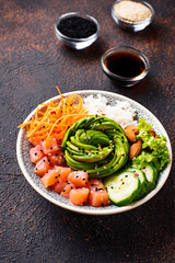 Hawaiian poke bowl with salmon, rice and vegetable
