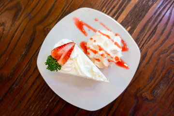 Strawberry crape cake top view on wooden