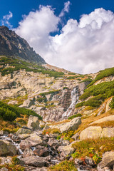Fototapeta na wymiar The Skok waterfall in Mlynicka valley of High Tatras National Park, Slovakia, Europe.
