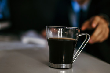 cup of black coffee in the office