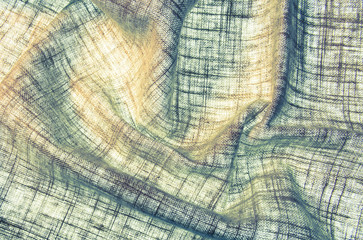 Rough fabric texture transparent waves for abstract background  with scissors