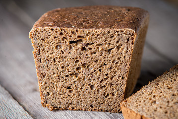 Healthy bread on old wooden background