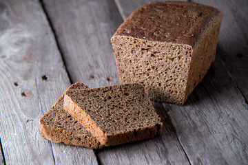Healthy bread on old wooden background