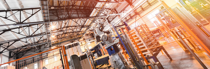 Fiberglass production industry equipment at manufacture background