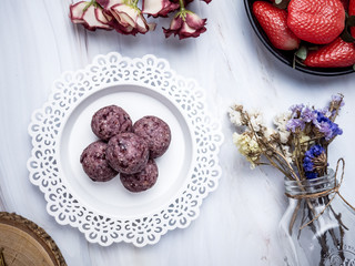 Healthy organic date energy balls with berry, dried fruits and nuts. Food for healthy lifestyle.