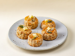 Homemade Cheese Scones with butter.