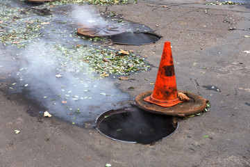 Odessa, Ukraine- Nov. 28, 2018: Accident on heating main. Burst pipes with hot water. Winter cold...