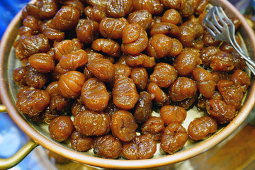 Marrons glaces candied chestnuts in an Italian candy store