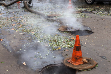 Odessa, Ukraine- Nov. 28, 2018: Accident on heating main. Burst pipes with hot water. Winter cold...