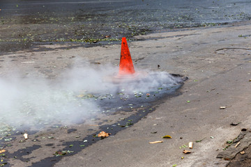 Odessa, Ukraine- Nov. 28, 2018: Accident on heating main. Burst pipes with hot water. Winter cold...