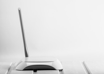 isolated white access point on table in office