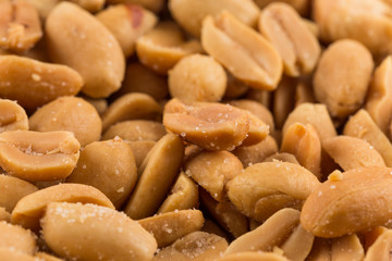 large amount of peeled salted peanuts