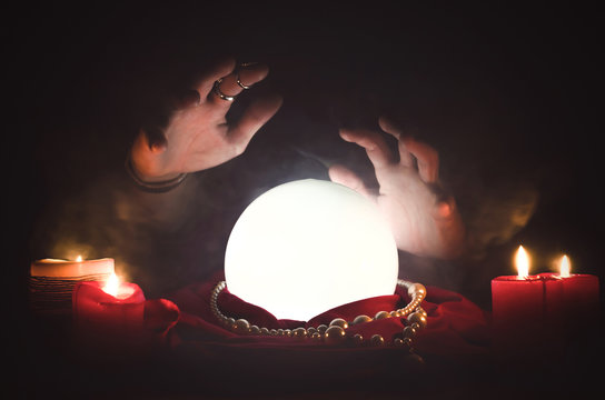 Crystal ball on the magic table background. Future reading.