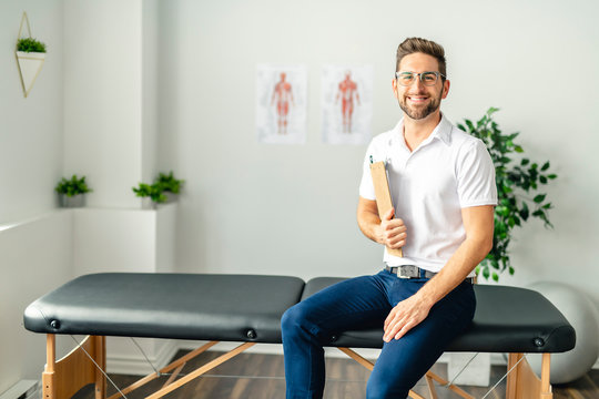 A Modern rehabilitation physiotherapy man at work