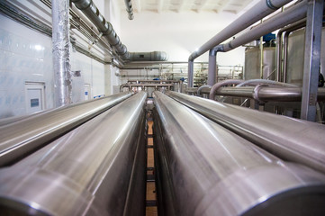 Fototapeta premium Industrial production of hard cheeses