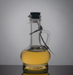 Still life with glass jars with oil. Enlightenment