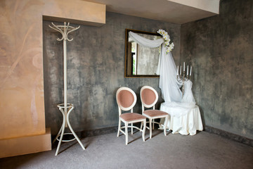 wedding vintage decor with veils, candles and orchids