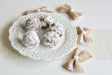 Tasty avocado chocolate candies on the white background