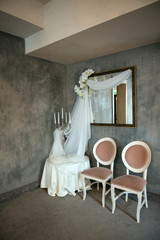 wedding vintage decor with veils, candles and orchids - vertical orientation