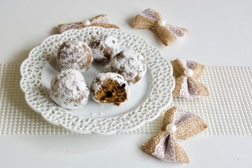 Tasty avocado chocolate candies on the white background