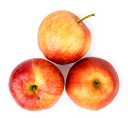 Three ripe apples on a white. The view from the top.