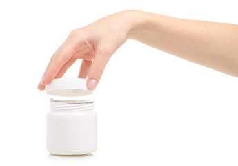 White jar medicine healthy in hand on white background isolation
