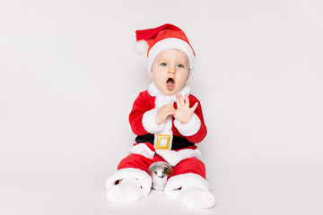 little Santa Claus sitting on the white background