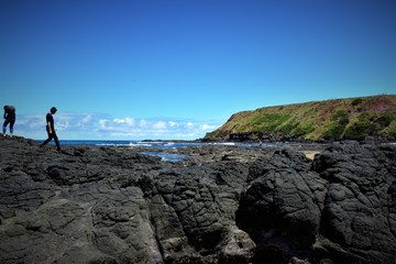 Man on top of mountain.Phillip Island .Australia