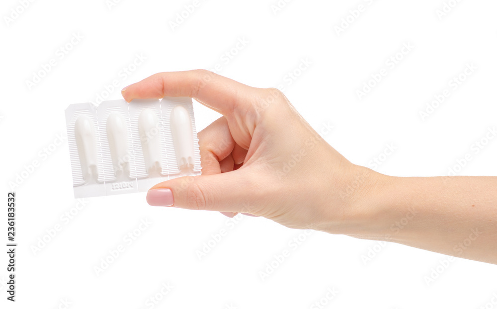 Sticker suppositories in hand medicine on a white background. isolation