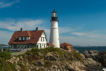 Fototapeta na wymiar Portland Head Lighthouse With Ram Island Ledge Light Station in Background
