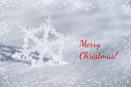 Christmas card with snowflake decoration and snow