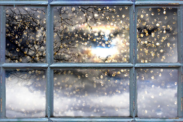 Snow falling outside the window