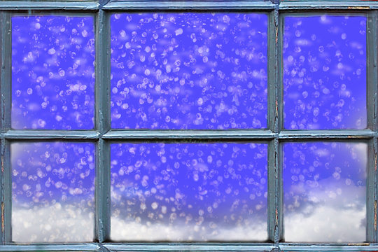 Snow Falling Outside The Window