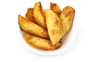 Fried Potato wedges. Fast food, isolated on a white background. Close-up