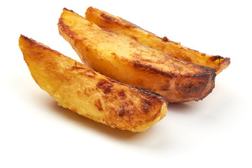 Fried Potato Wedges in a bowl, isolated on a white background. Close-up