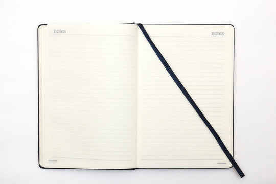 Notebook and pen on white background. Abstract background for drawing and sketching. diary for business and study.
